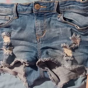 Blue ripped jean shorts